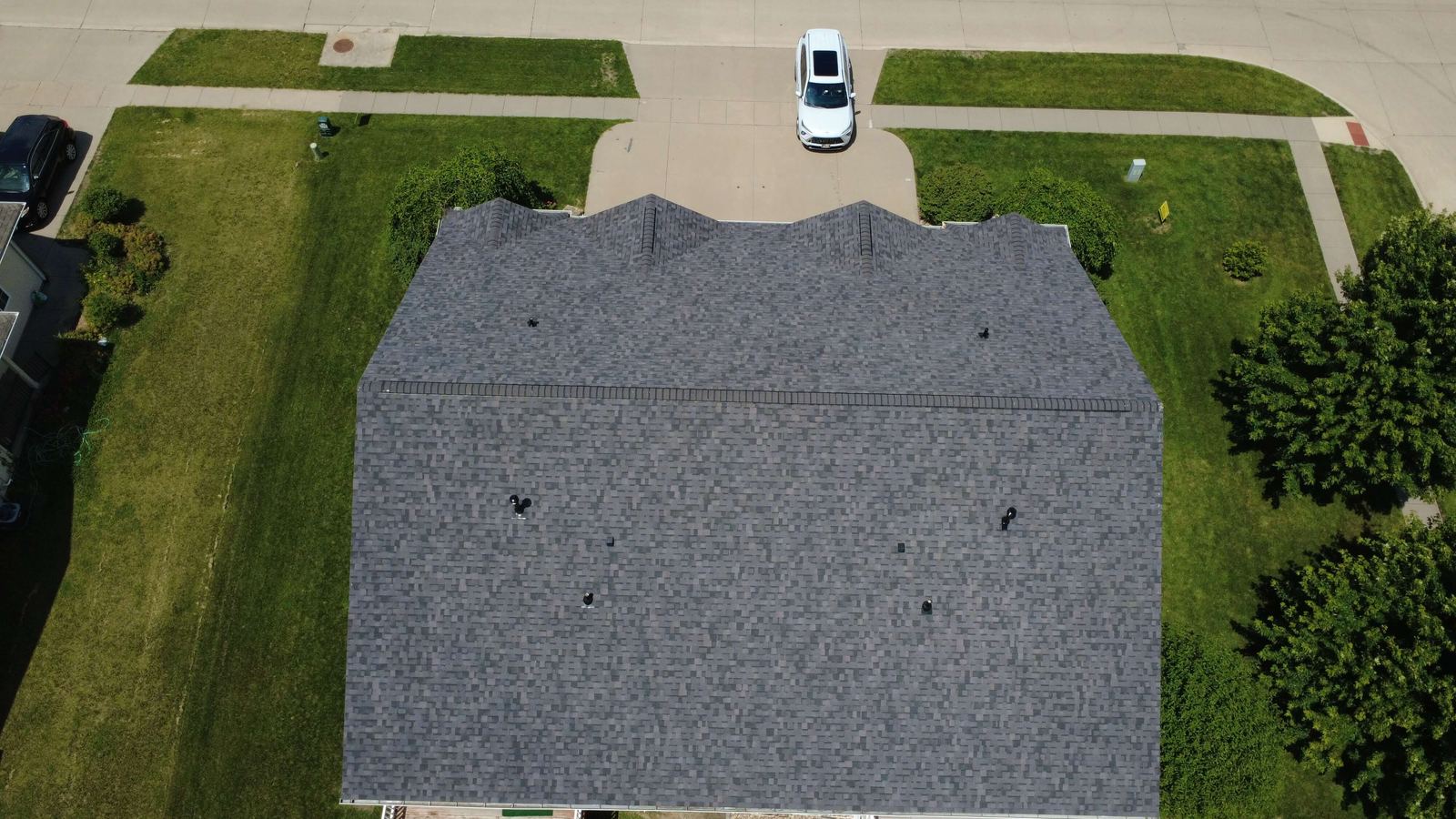 Finished roof replacement on a townhouse in North Liberty, Iowa, overhead drone photo